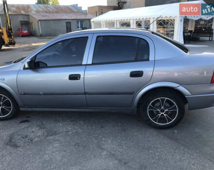 Серый Опель Астра, объемом двигателя 1.4 л и пробегом 254 тыс. км за 3500 $, фото 4 на Automoto.ua