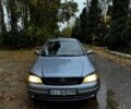 Сірий Опель Астра, об'ємом двигуна 1.6 л та пробігом 450 тис. км за 2301 $, фото 2 на Automoto.ua