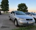 Серый Опель Астра, объемом двигателя 1.4 л и пробегом 253 тыс. км за 3500 $, фото 1 на Automoto.ua