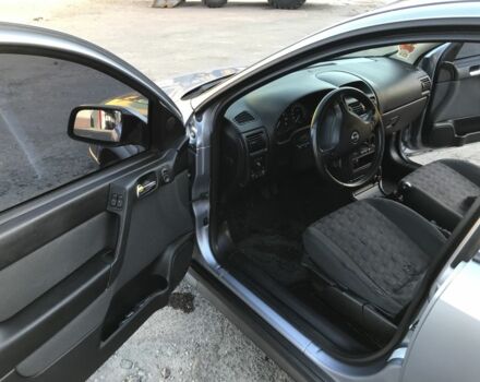 Серый Опель Астра, объемом двигателя 1.4 л и пробегом 254 тыс. км за 3500 $, фото 9 на Automoto.ua