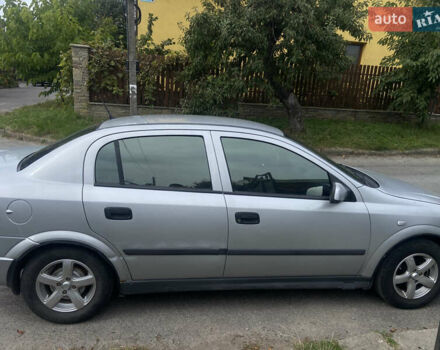 Серый Опель Астра, объемом двигателя 1.4 л и пробегом 310 тыс. км за 3200 $, фото 2 на Automoto.ua