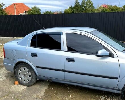 Серый Опель Астра, объемом двигателя 1.4 л и пробегом 264 тыс. км за 2500 $, фото 4 на Automoto.ua