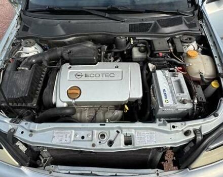 Серый Опель Астра, объемом двигателя 1.6 л и пробегом 148 тыс. км за 4500 $, фото 11 на Automoto.ua