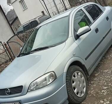 Серый Опель Астра, объемом двигателя 1.6 л и пробегом 115 тыс. км за 4500 $, фото 2 на Automoto.ua