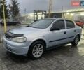 Серый Опель Астра, объемом двигателя 1.4 л и пробегом 300 тыс. км за 3200 $, фото 1 на Automoto.ua