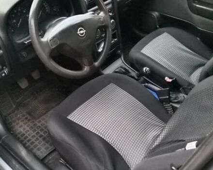 Серый Опель Астра, объемом двигателя 1.6 л и пробегом 225 тыс. км за 3850 $, фото 7 на Automoto.ua