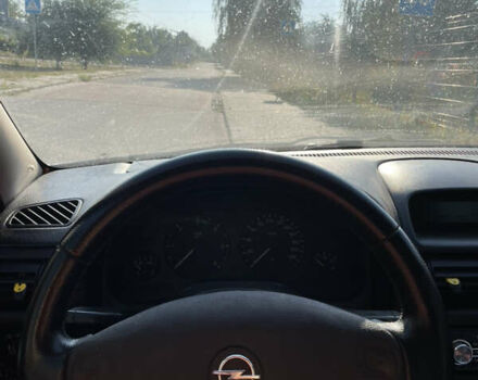 Серый Опель Астра, объемом двигателя 1.6 л и пробегом 300 тыс. км за 2600 $, фото 3 на Automoto.ua