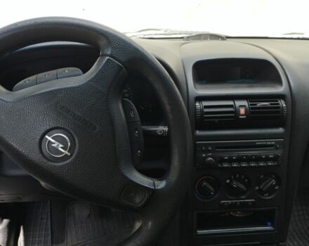 Серый Опель Астра, объемом двигателя 1.6 л и пробегом 231 тыс. км за 3000 $, фото 11 на Automoto.ua