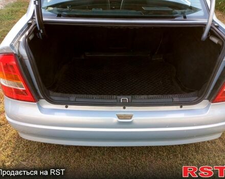 Серый Опель Астра, объемом двигателя 1.6 л и пробегом 174 тыс. км за 4000 $, фото 4 на Automoto.ua