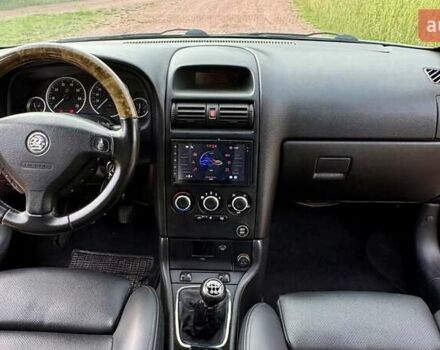 Серый Опель Астра, объемом двигателя 1.6 л и пробегом 148 тыс. км за 4500 $, фото 5 на Automoto.ua