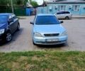Серый Опель Астра, объемом двигателя 1.4 л и пробегом 246 тыс. км за 3500 $, фото 1 на Automoto.ua