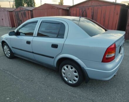 Серый Опель Астра, объемом двигателя 1.4 л и пробегом 180 тыс. км за 6400 $, фото 3 на Automoto.ua