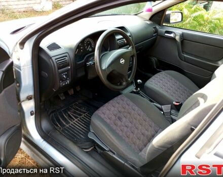 Серый Опель Астра, объемом двигателя 1.6 л и пробегом 174 тыс. км за 4000 $, фото 6 на Automoto.ua