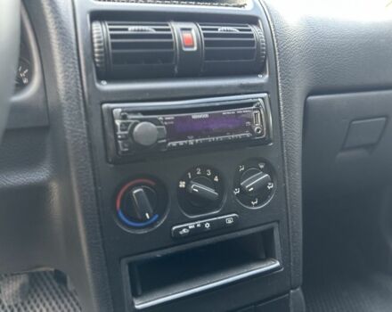 Серый Опель Астра, объемом двигателя 1.6 л и пробегом 140 тыс. км за 3999 $, фото 7 на Automoto.ua