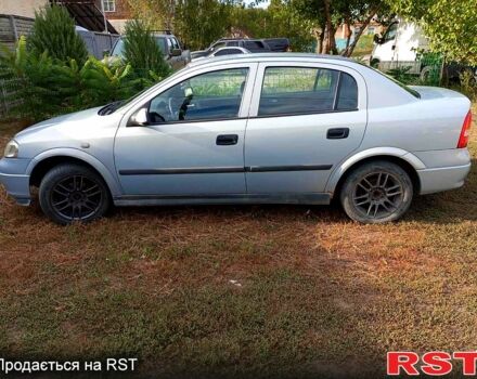 Серый Опель Астра, объемом двигателя 1.6 л и пробегом 174 тыс. км за 4000 $, фото 1 на Automoto.ua