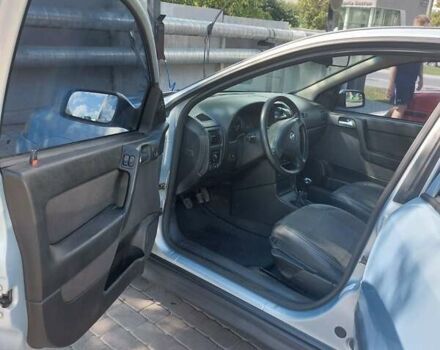 Серый Опель Астра, объемом двигателя 1.6 л и пробегом 302 тыс. км за 3500 $, фото 14 на Automoto.ua