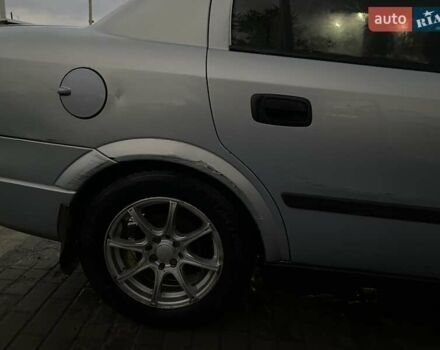 Серый Опель Астра, объемом двигателя 1.4 л и пробегом 300 тыс. км за 3200 $, фото 8 на Automoto.ua