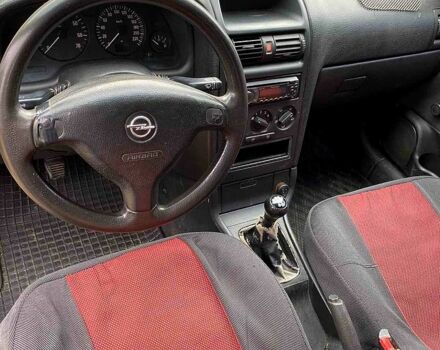 Серый Опель Астра, объемом двигателя 1.4 л и пробегом 264 тыс. км за 2500 $, фото 7 на Automoto.ua