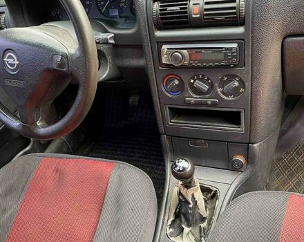 Серый Опель Астра, объемом двигателя 1.4 л и пробегом 264 тыс. км за 2500 $, фото 8 на Automoto.ua