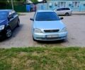 Серый Опель Астра, объемом двигателя 1.4 л и пробегом 246 тыс. км за 3500 $, фото 1 на Automoto.ua