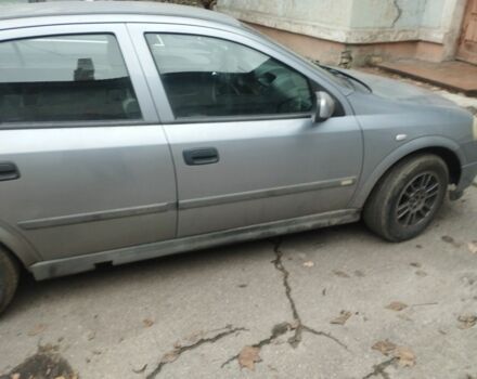 Серый Опель Астра, объемом двигателя 1.6 л и пробегом 231 тыс. км за 3000 $, фото 13 на Automoto.ua