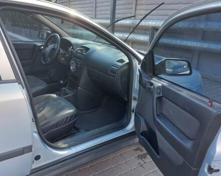 Серый Опель Астра, объемом двигателя 1.6 л и пробегом 302 тыс. км за 3500 $, фото 19 на Automoto.ua