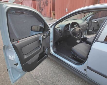 Серый Опель Астра, объемом двигателя 1.4 л и пробегом 180 тыс. км за 6400 $, фото 6 на Automoto.ua