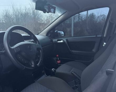 Серый Опель Астра, объемом двигателя 1.4 л и пробегом 300 тыс. км за 5000 $, фото 11 на Automoto.ua