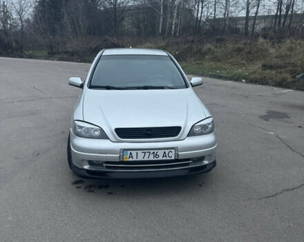 Серый Опель Астра, объемом двигателя 1.4 л и пробегом 300 тыс. км за 5000 $, фото 2 на Automoto.ua