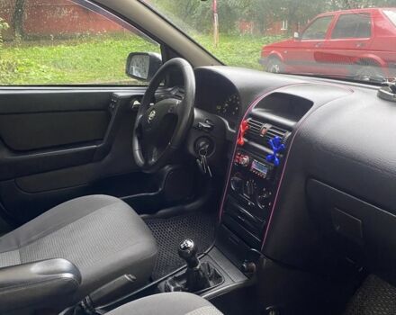 Серый Опель Астра, объемом двигателя 1.4 л и пробегом 348 тыс. км за 2950 $, фото 4 на Automoto.ua