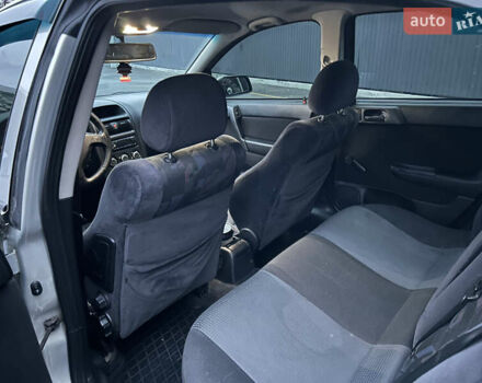 Серый Опель Астра, объемом двигателя 1.4 л и пробегом 269 тыс. км за 2200 $, фото 11 на Automoto.ua