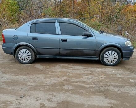 Серый Опель Астра, объемом двигателя 1.4 л и пробегом 210 тыс. км за 3200 $, фото 5 на Automoto.ua