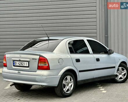 Серый Опель Астра, объемом двигателя 1.39 л и пробегом 240 тыс. км за 2800 $, фото 4 на Automoto.ua