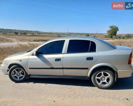 Серый Опель Астра, объемом двигателя 1.39 л и пробегом 260 тыс. км за 2950 $, фото 1 на Automoto.ua