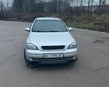 Серый Опель Астра, объемом двигателя 1.4 л и пробегом 300 тыс. км за 5000 $, фото 2 на Automoto.ua