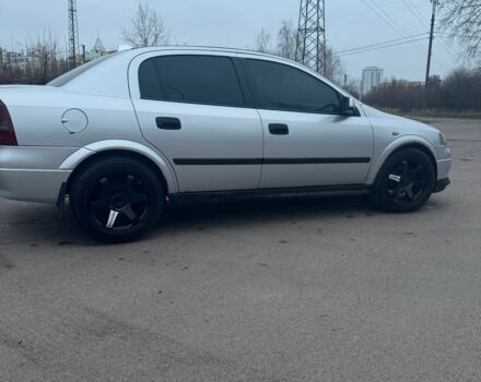 Серый Опель Астра, объемом двигателя 1.4 л и пробегом 300 тыс. км за 5000 $, фото 4 на Automoto.ua