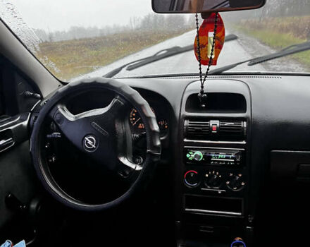 Серый Опель Астра, объемом двигателя 1.39 л и пробегом 223 тыс. км за 3800 $, фото 7 на Automoto.ua