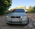 Серый Опель Астра, объемом двигателя 1.4 л и пробегом 216 тыс. км за 3100 $, фото 2 на Automoto.ua