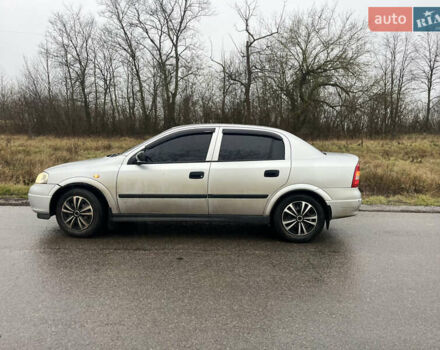 Серый Опель Астра, объемом двигателя 1.39 л и пробегом 223 тыс. км за 3800 $, фото 2 на Automoto.ua