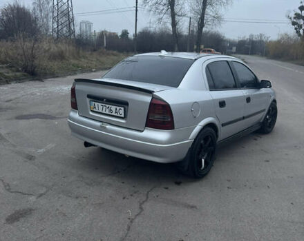 Серый Опель Астра, объемом двигателя 1.4 л и пробегом 300 тыс. км за 5000 $, фото 6 на Automoto.ua