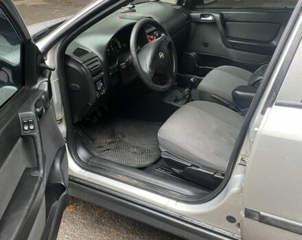 Серый Опель Астра, объемом двигателя 1.4 л и пробегом 348 тыс. км за 2950 $, фото 7 на Automoto.ua