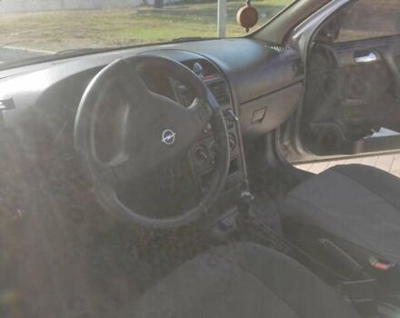 Серый Опель Астра, объемом двигателя 1.39 л и пробегом 242 тыс. км за 3800 $, фото 11 на Automoto.ua