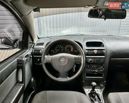 Серый Опель Астра, объемом двигателя 1.39 л и пробегом 240 тыс. км за 2800 $, фото 7 на Automoto.ua