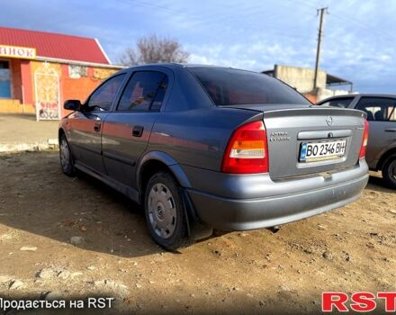 Серый Опель Астра, объемом двигателя 1.4 л и пробегом 212 тыс. км за 3000 $, фото 1 на Automoto.ua