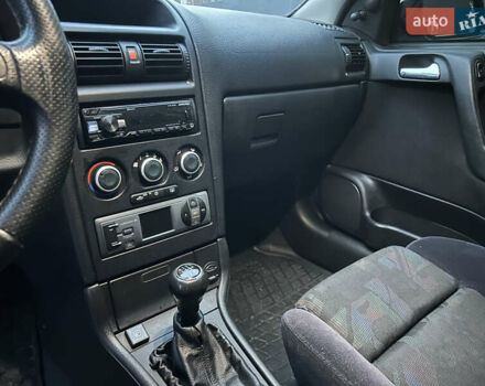 Серый Опель Астра, объемом двигателя 1.4 л и пробегом 269 тыс. км за 2200 $, фото 10 на Automoto.ua