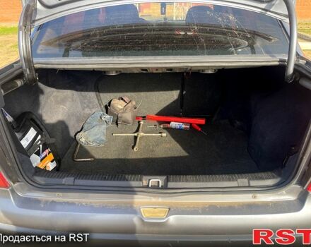 Серый Опель Астра, объемом двигателя 1.4 л и пробегом 212 тыс. км за 3000 $, фото 4 на Automoto.ua