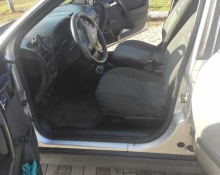 Серый Опель Астра, объемом двигателя 1.39 л и пробегом 242 тыс. км за 3800 $, фото 12 на Automoto.ua