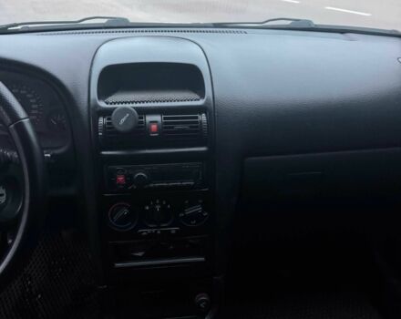 Серый Опель Астра, объемом двигателя 1.4 л и пробегом 300 тыс. км за 5000 $, фото 9 на Automoto.ua