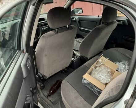 Серый Опель Астра, объемом двигателя 1.4 л и пробегом 120 тыс. км за 3800 $, фото 8 на Automoto.ua