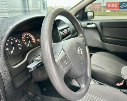 Серый Опель Астра, объемом двигателя 1.39 л и пробегом 240 тыс. км за 2800 $, фото 6 на Automoto.ua
